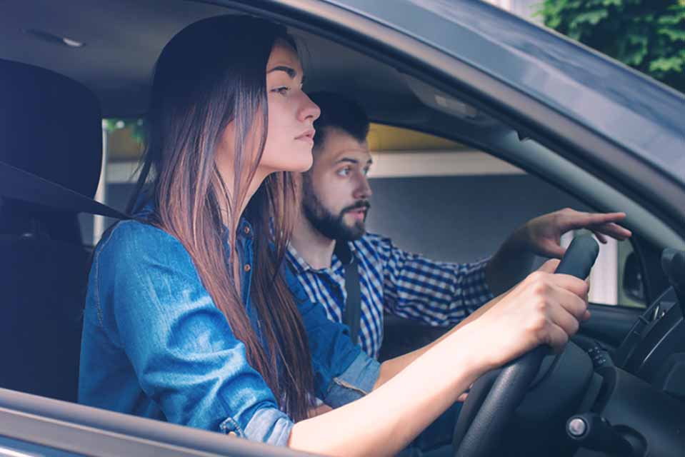 Young girl learning how to drive