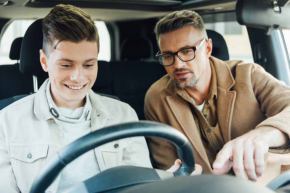 Young guy learning how to drive