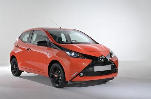 an orange toyota aygo