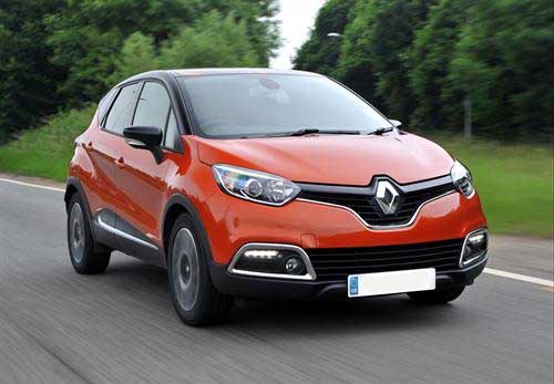 orange renault captur on the road