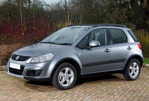 a suzuki sx4 on a drive way